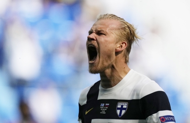 2021_06_16T130634Z_426451931_UP1EH6G10EW4J_RTRMADP_3_SOCCER_EURO_FIN_RUS_REPORT_1