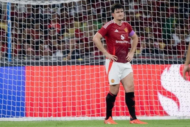 Harry Maguire sẽ không sang Mỹ cùng Man Utd (Ảnh: The Sun).