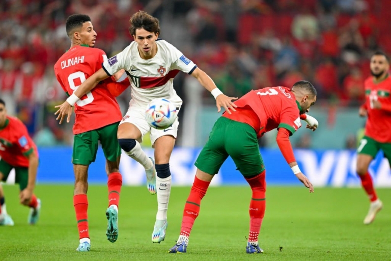 Bạn muốn biết kết quả của trận đấu giữa Bồ Đào Nha và Ma Rốc? Hãy xem bức ảnh đầy kịch tính này để biết ai là đội chiến thắng trong trận đấu đầy căng thẳng này.