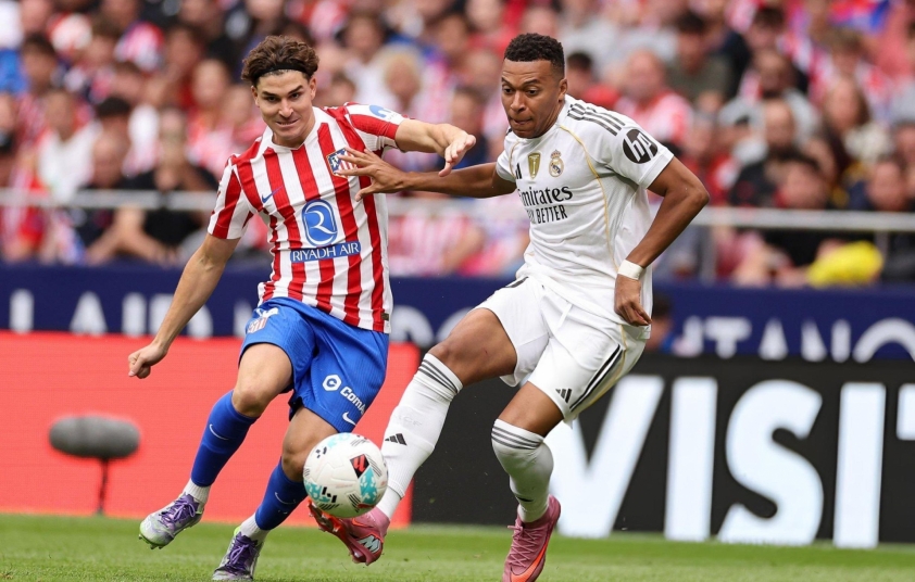 Vinicius khẩu chiến với Koke trong trận derby thành Madrid 713562