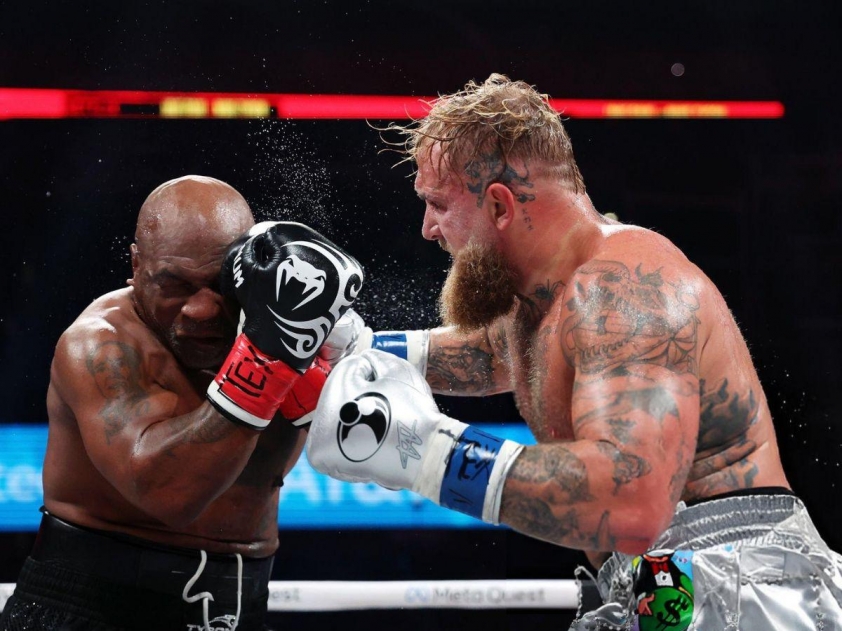 Vén màn lí do Mike Tyson cắn găng trong trận đấu với Jake Paul-557666