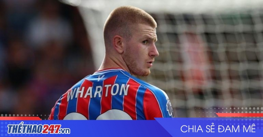 top-adam-wharton-looks-on