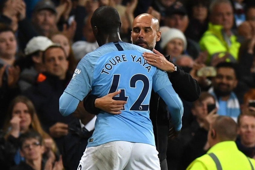 Trái ngược với Kolo Toure, Pep Guardiola không bao giờ có một mối quan hệ bình lặng với em trai Yaya Toure (Ảnh: The Independent).
