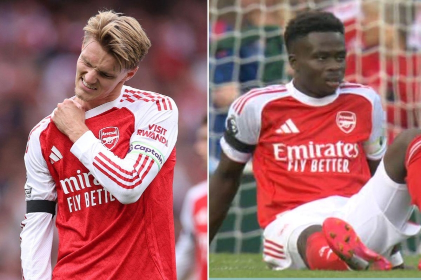 Odegaard và Saka đều phải rời sân vì chấn thương (Ảnh: The Sun).