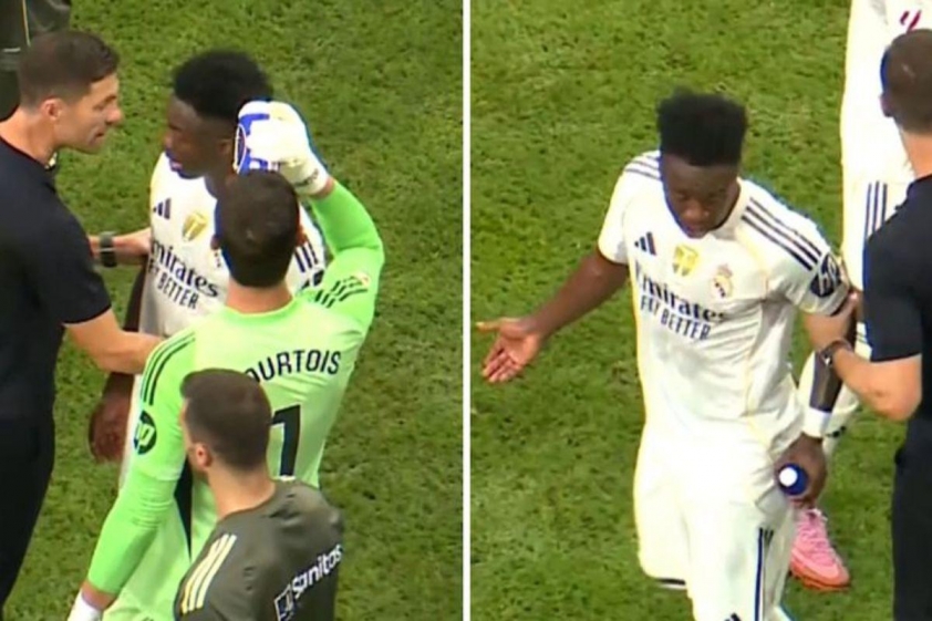 Vinicius đã trò chuyện với HLV Xabi Alonso, trước khi vứt chai nước xuống đất, di chuyển đến ghế dự bị.