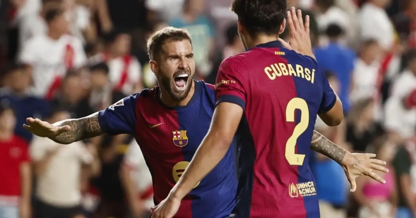 Bộ đôi trung vệ ăn ý của Barca mùa trước. (Ảnh: ESPN)