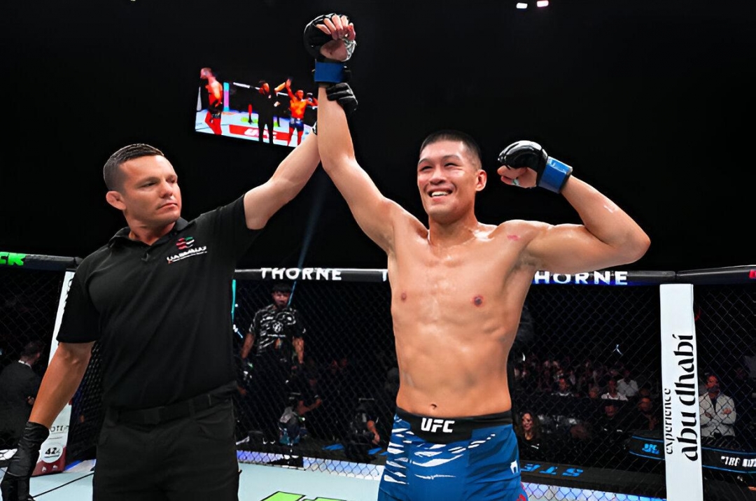 Võ sĩ gốc Việt khiến đối thủ biến dạng, lập kỉ lục UFC