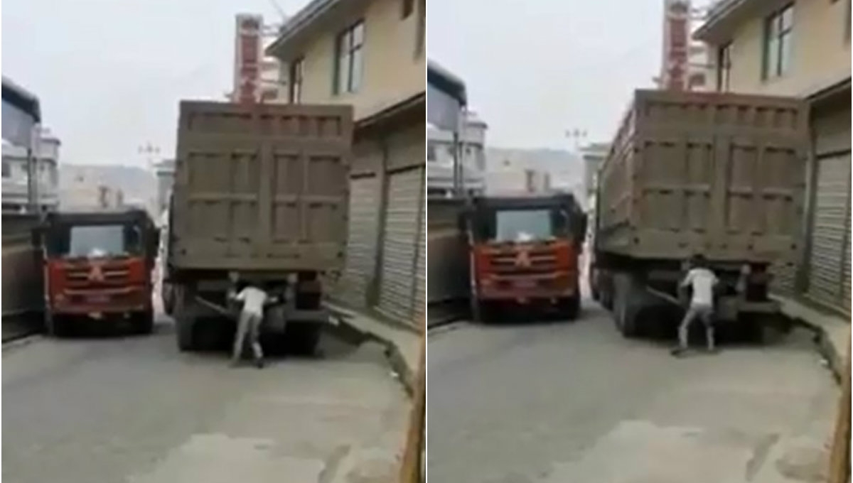 VIDEO: Thanh niên dùng tay bênh đuôi xe container như lực sĩ