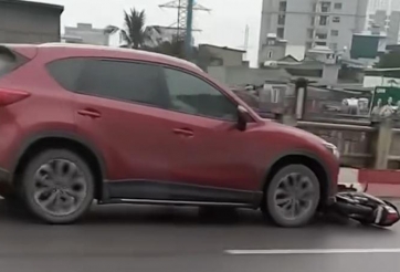Triệu tập tài xế Mazda CX-5 kéo lê xe máy sau tai nạn trên cầu Vĩnh Tuy