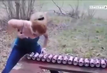 VIDEO: Người đẹp dùng ngực đập vỡ 20 lon bia