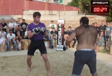 VIDEO: 'Người sói MMA' bị võ sĩ đường phố đấm gục đau đớn