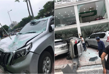 Toyota Vios “bay” từ tầng 2 showroom xe xuống đất