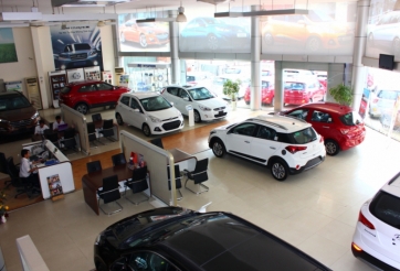 Không giao xe đúng hẹn hợp đồng, đại lý có phải bồi thường ?