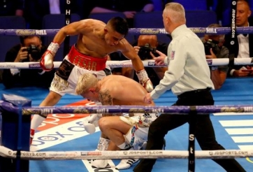 LẠ LÙNG: Võ sĩ vô địch thế giới dù bị đấm 'tối tăm mặt mũi'