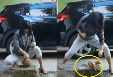 VIDEO: Nữ sinh Việt gây sốc với cú đấm nát quả sầu riêng và tảng đá