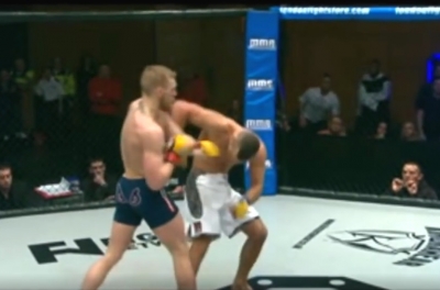 VIDEO: Né đòn thần tốc, McGregor đấm móc như điện tiễn đối thủ vào cơn mê