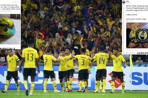CĐV Malaysia bán đồ để chạy xe buýt tới Thái Lan xem AFF Cup