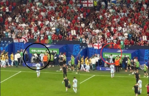 Ronaldo túm cổ áo, bực tức khi rời khỏi sân vận động