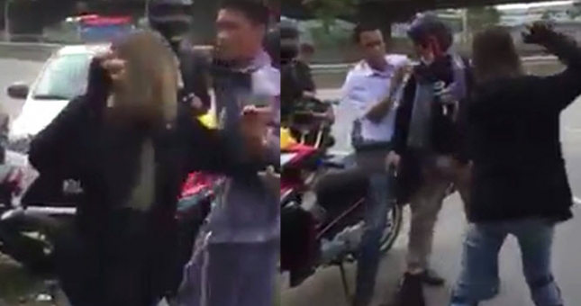 Nữ phượt thủ xinh đẹp nổi tiếng cầm gạch đòi 'choảng' tài xế taxi ngay giữa đường 