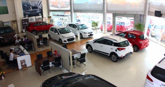 Không giao xe đúng hẹn hợp đồng, đại lý có phải bồi thường ?