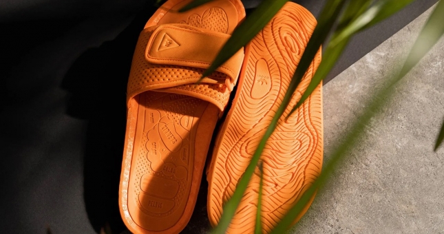 Adidas và Pharrell ra mắt dép lấp đầy với đệm Boost