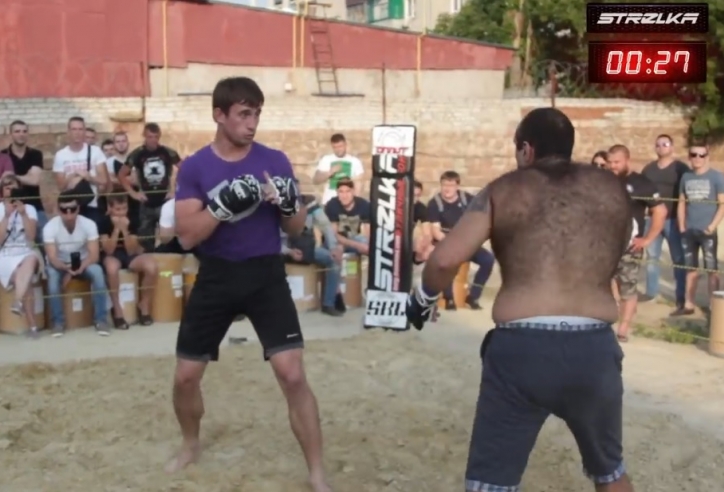 VIDEO: 'Người sói MMA' bị võ sĩ đường phố đấm gục đau đớn