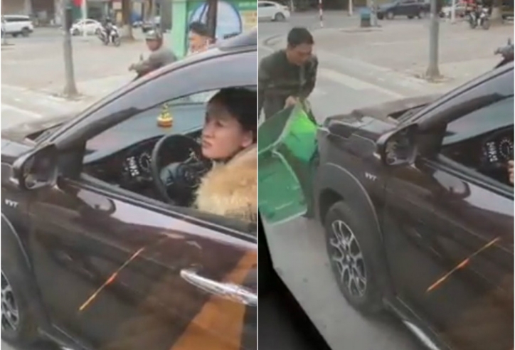 VIDEO: Nữ tài xế lái ô tô 'ủn' thùng rác đi quanh phố phường