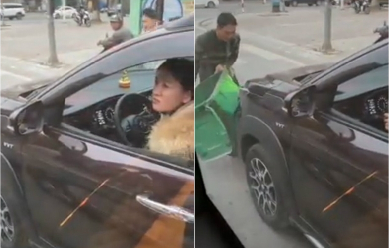 VIDEO: Nữ tài xế lái ô tô 'ủn' thùng rác đi quanh phố phường