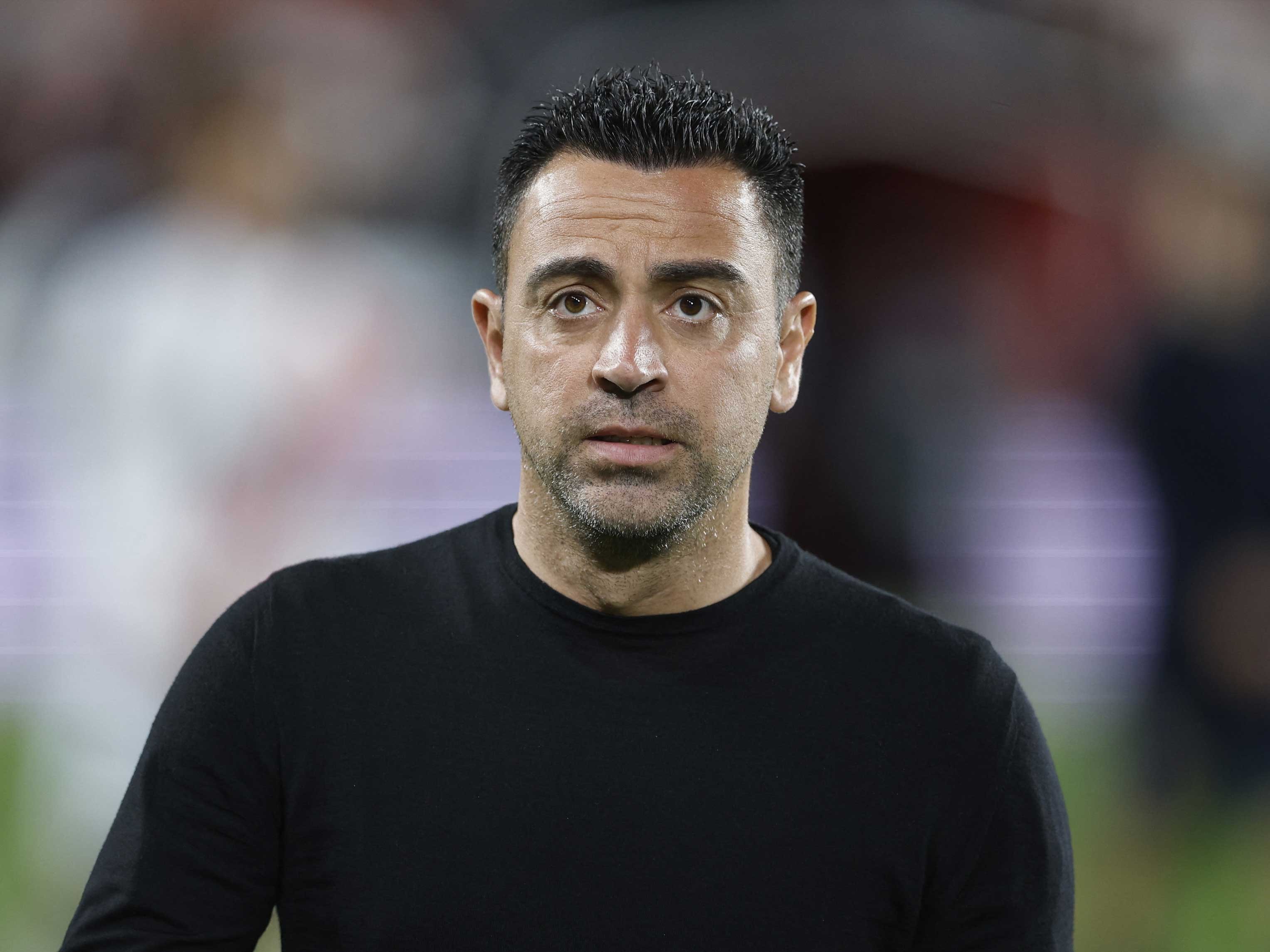 xavi-barca-1699868498.jpg