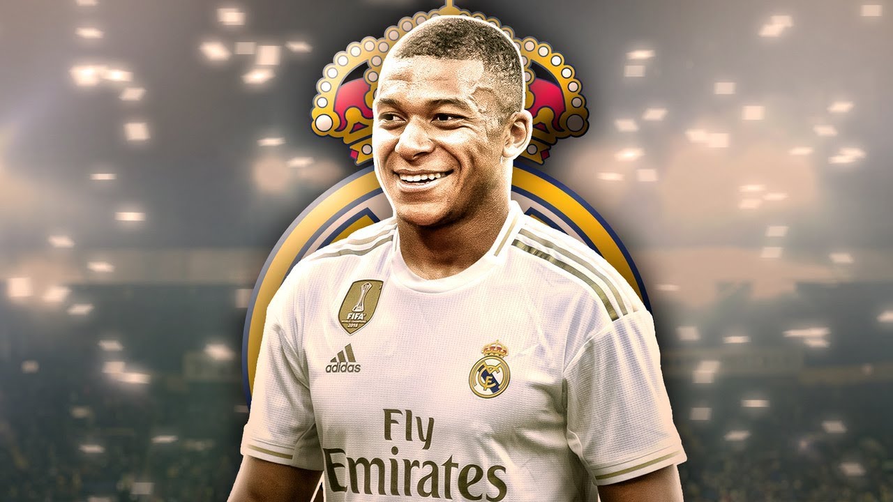  Kylian Mbappe is pictured in a Real Madrid jersey with a crown above his head.